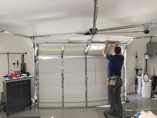 Rehoboth Garage Door Repair specialist performing precise section replacement on Rehoboth garage door