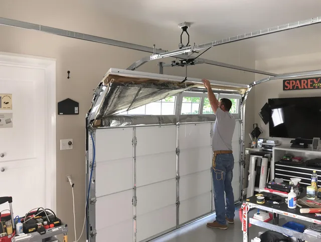 Garage door section replacement by Rehoboth Garage Door Repair in Rehoboth