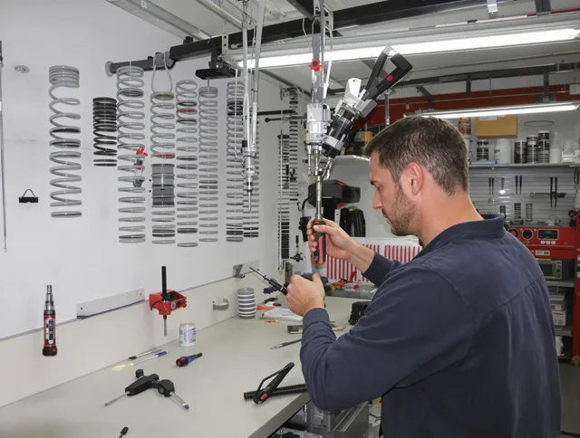 Rehoboth Garage Door Repair safety certified technician performing precision spring replacement in Rehoboth