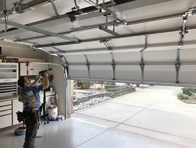 Garage door track repair service by Rehoboth Garage Door Repair in Rehoboth